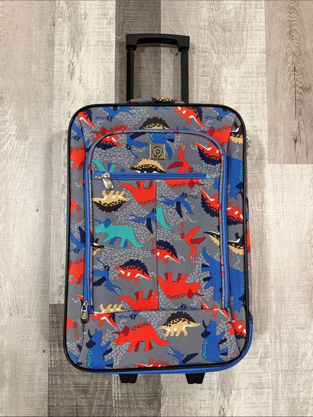 Amazon Kids Rolling Luggage with Red, Blue, Teal & Tan Dinosaur Print